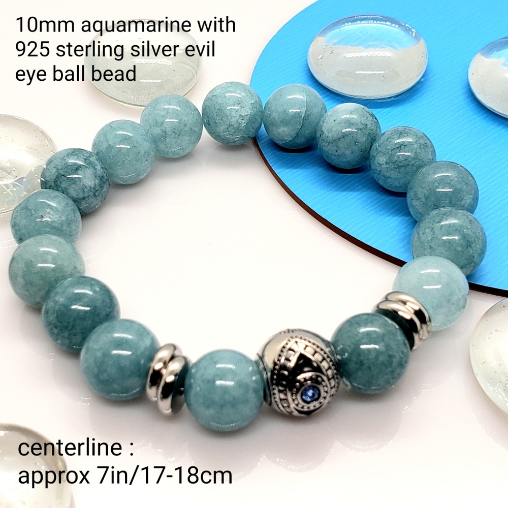 Handcrafted aquamarine stretch bracelet w/ 925 sterling silver evil eye